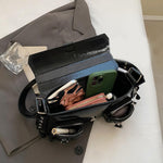 PALAY Shoulder Bag for Women 27x7x16 cm with Braided Sides and Metallic Eyelets | Black PU Hobo