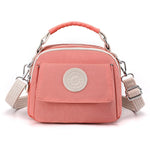 PALAY Womens Crossbody Bag for Travel with Triple Zipper Layers 21x10x18cm Waterproof Pink